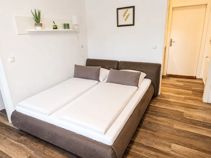 Doppelbett in Wohnung 3